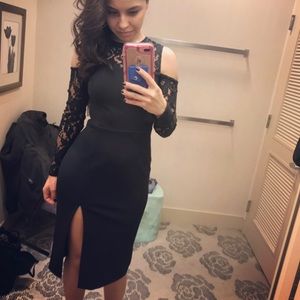 Beautiful black dress with lace sleeves. Only wore ONCE
